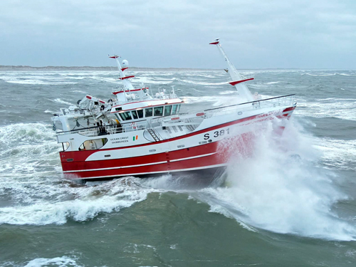Ocean crest fishing vessel sailing in rough weather