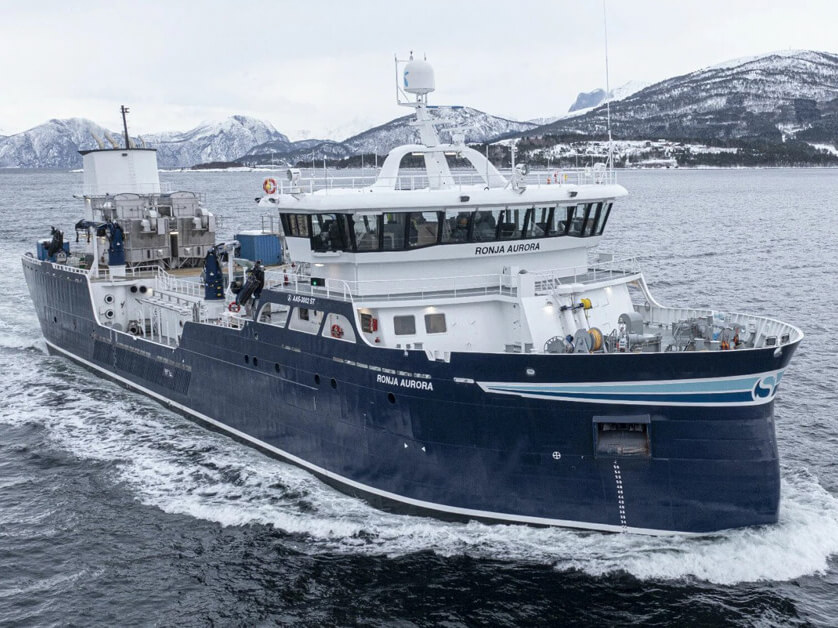 The Norwegian ship Ronja Aurora sails along the Norwegian coast, where it transports live fish for the shipping company Sølvtrans