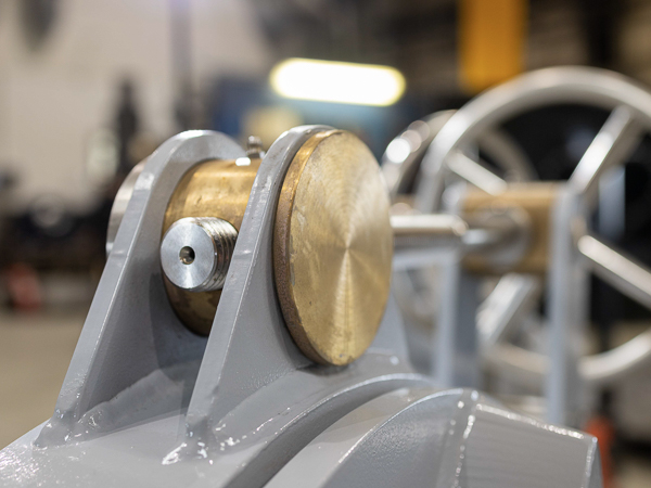 Close-up of a robust brass component in a marine winch system for heavy-duty operations