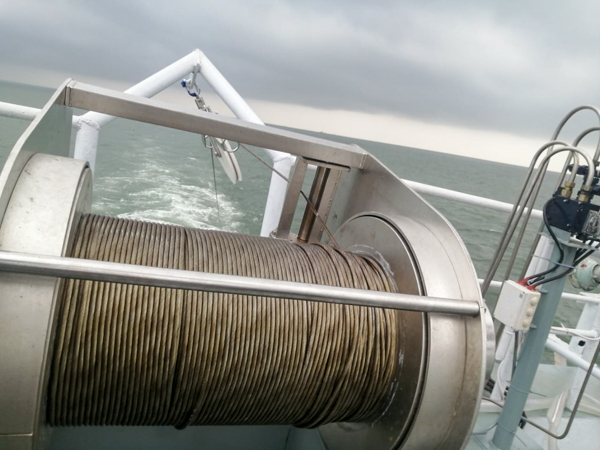 Netsounder winch installed on vessel in operation at sea