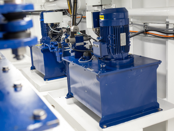 Twin hydraulic power units supplying pressure to the steering gear system on the vessel Skawlink, ensuring reliable and precise rudder control.