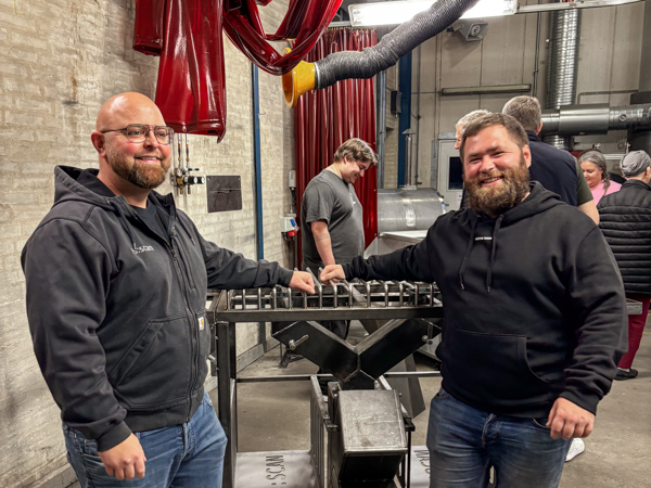 Martin Ivan and Henning Fjord Lodberg beside Martin’s barbecue trolley in the workshop at Skjern Technical College.